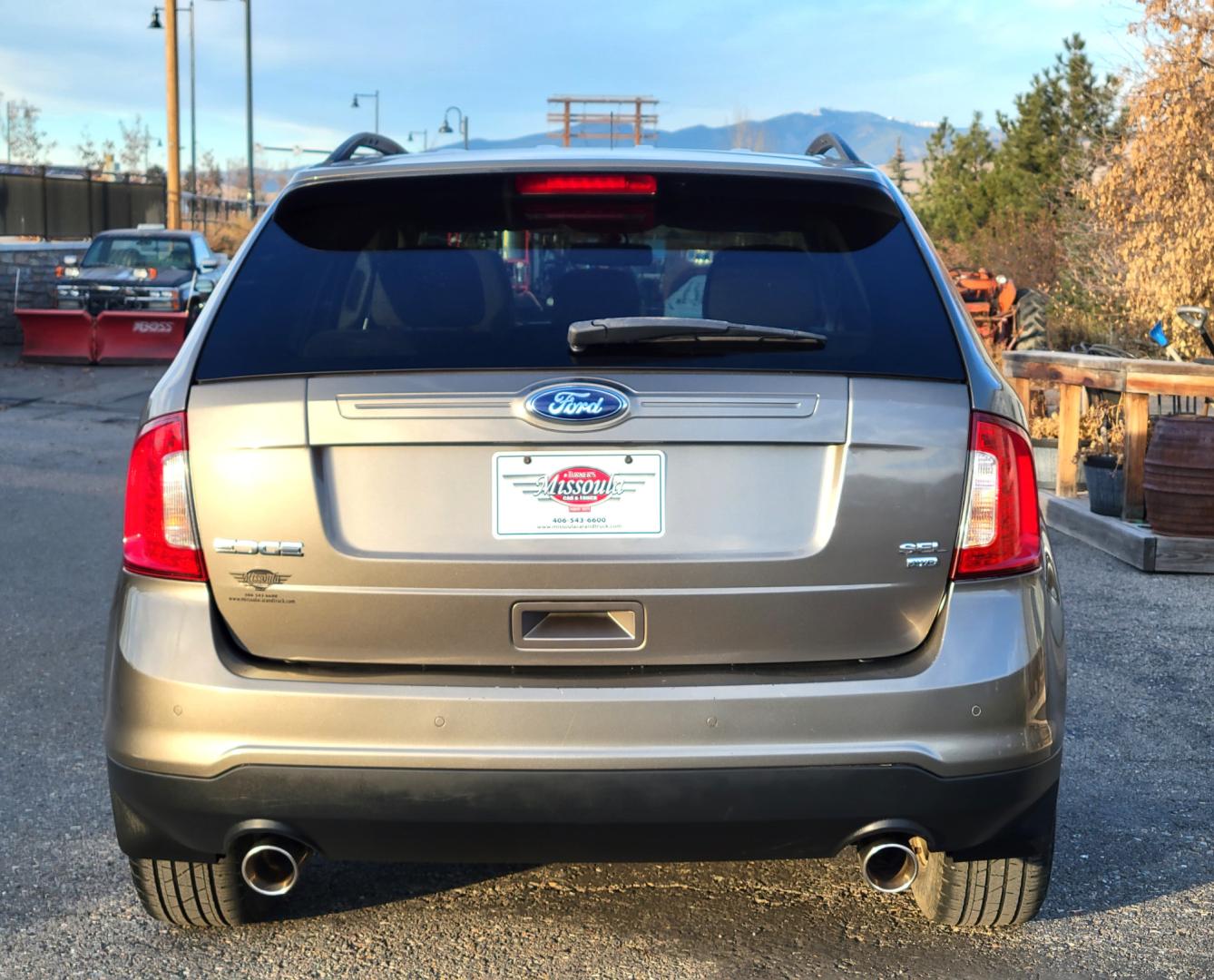 2013 Grey /Gray Ford Edge SEL (2FMDK4JC9DB) with an 3.5L V6 engine, 6-Speed Automatic transmission, located at 450 N Russell, Missoula, MT, 59801, (406) 543-6600, 46.874496, -114.017433 - Nice All Wheel Drive. Air. Cruise. Tilt. Power Windows and Locks. Bluetooth. Nice Cooper Tires. - Photo#6